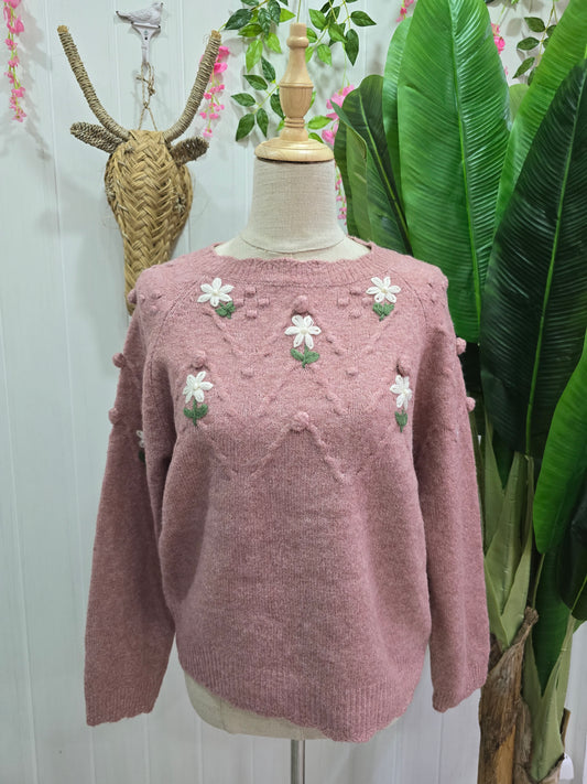 Camisola rosa com flores e pompons