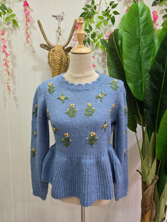 Camisola azul com flores amarelas