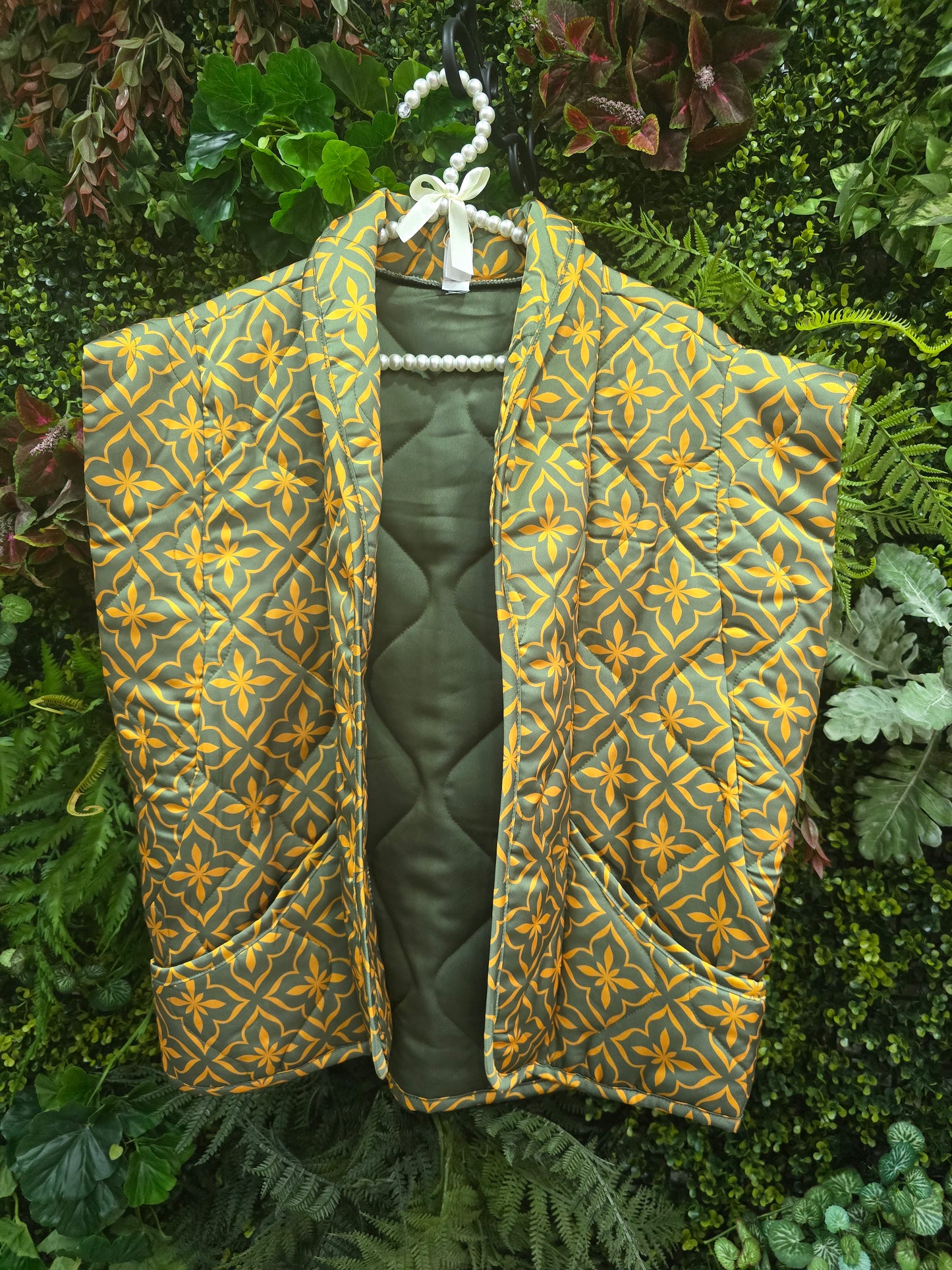 Colete impermeável verde