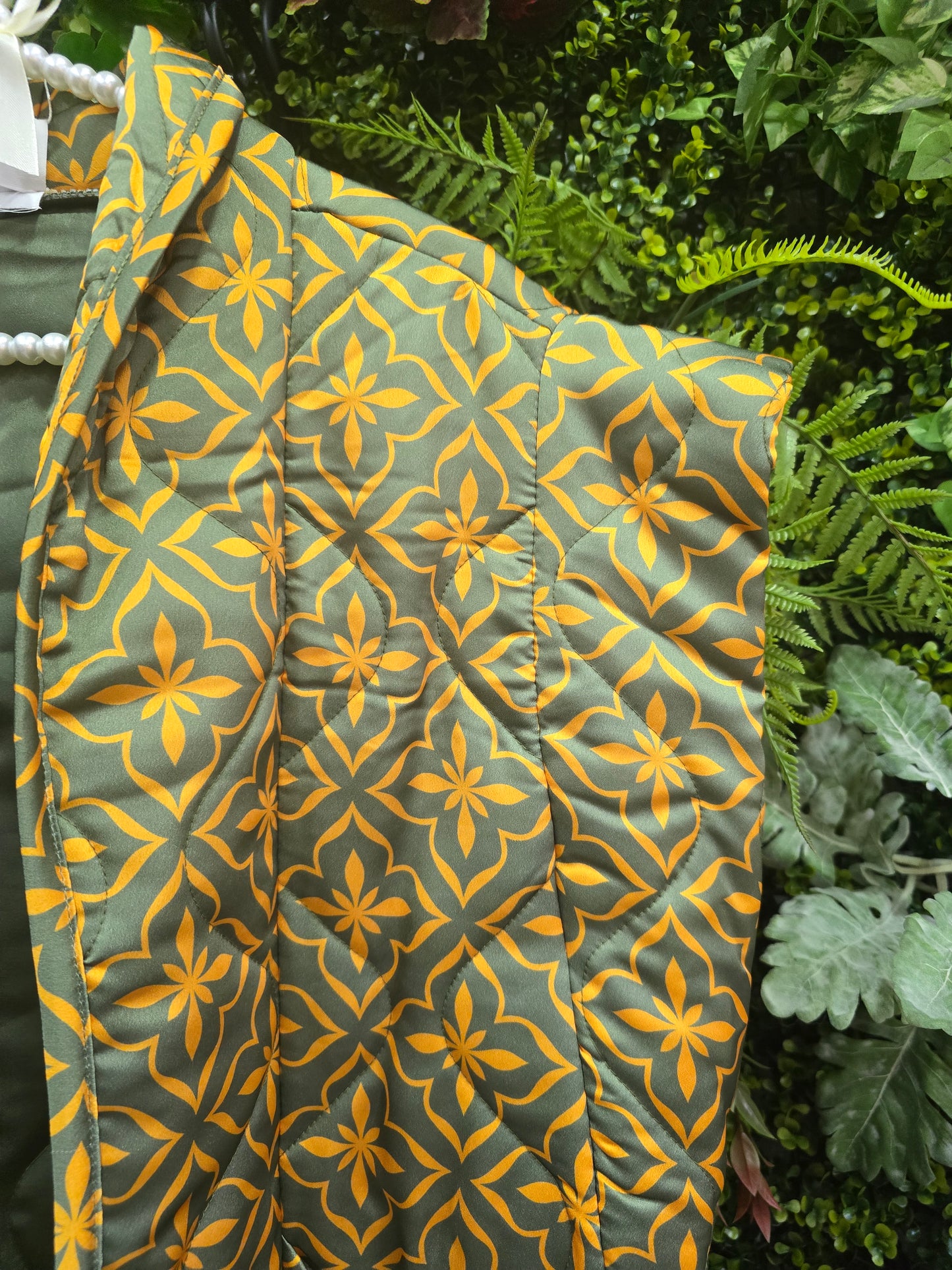 Colete impermeável verde