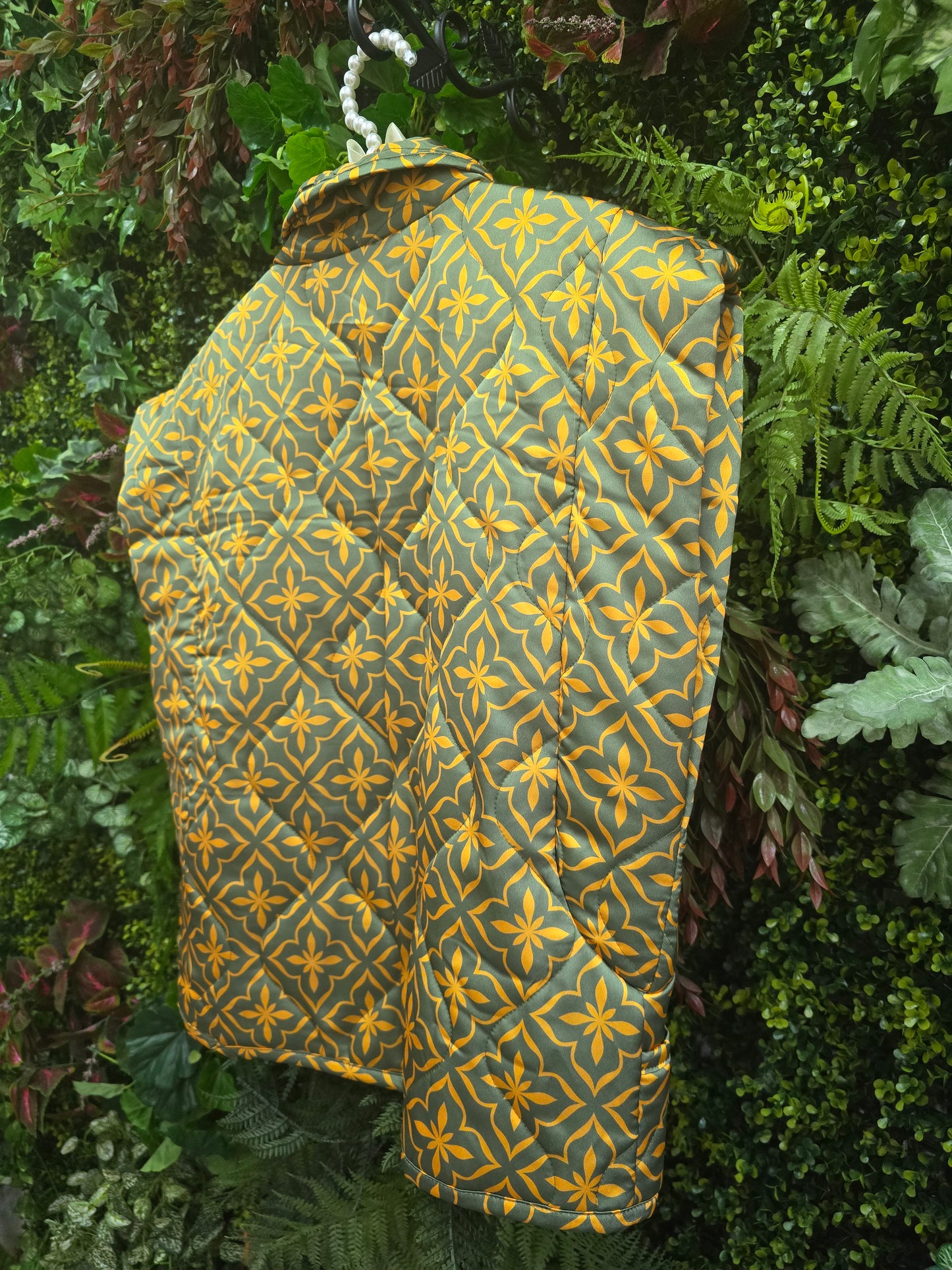 Colete impermeável verde